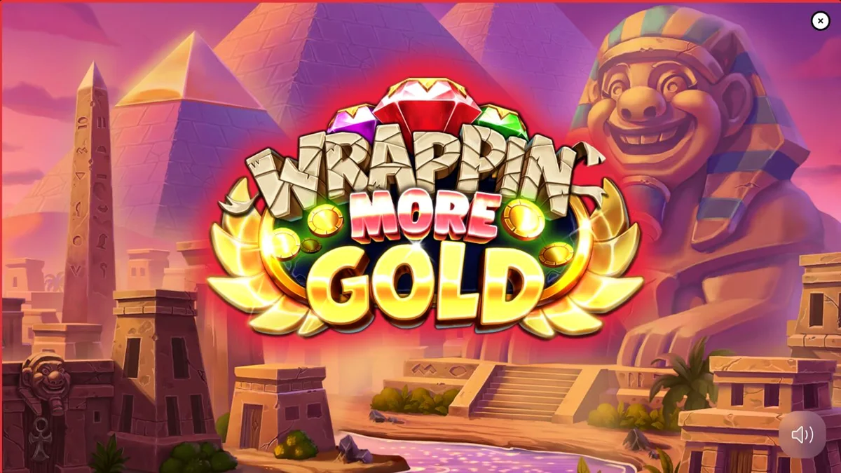 Tampilan visual slot Wrappin’ More Gold dengan karakter mumi yang ramah dan latar belakang Mesir Kuno yang penuh warna.